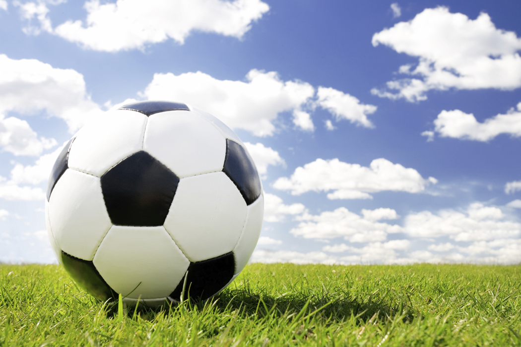 A soccer scene with players and ball